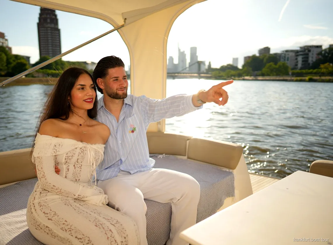 Frankfurt skyline at sunset seen from the romantic couples boat cruise