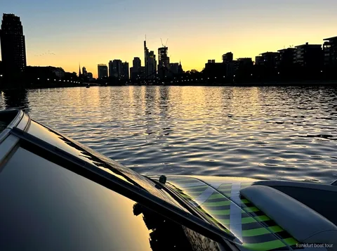 Passengers enjoying the Frankfurt speedboat tour near the European Central Bank