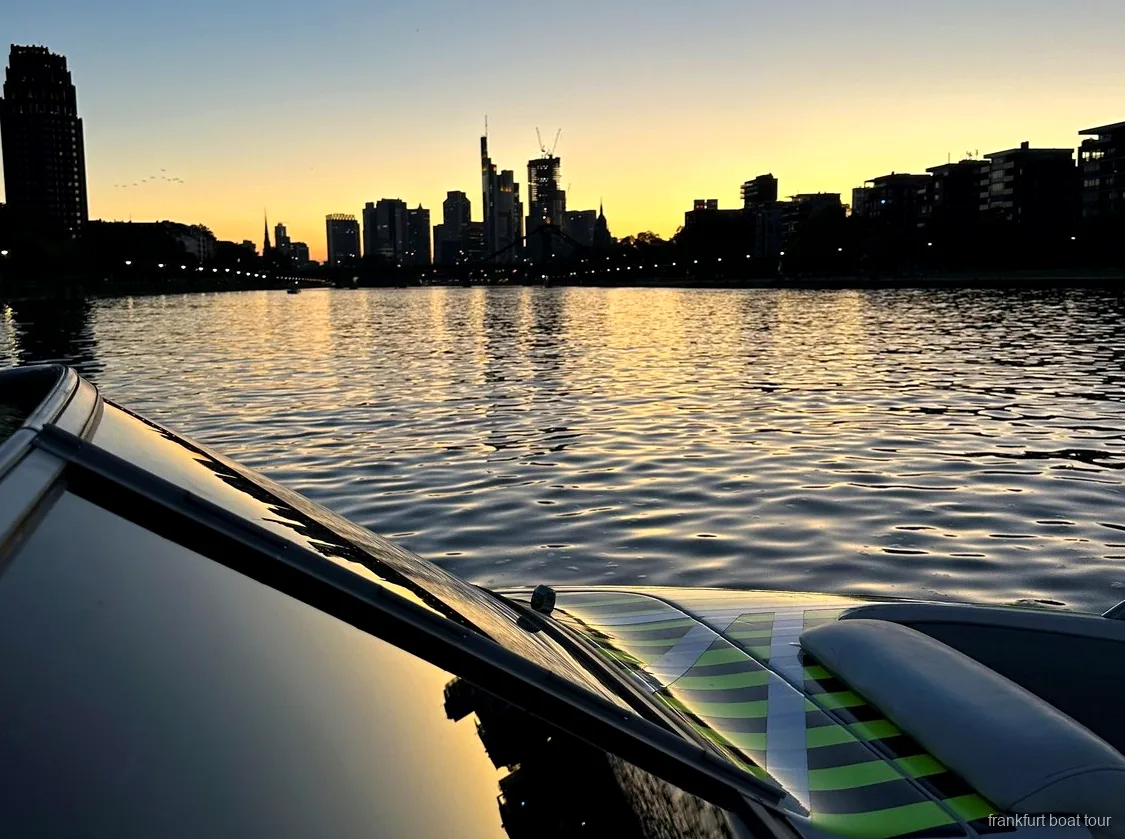 Passengers enjoying the Frankfurt speedboat tour near the European Central Bank